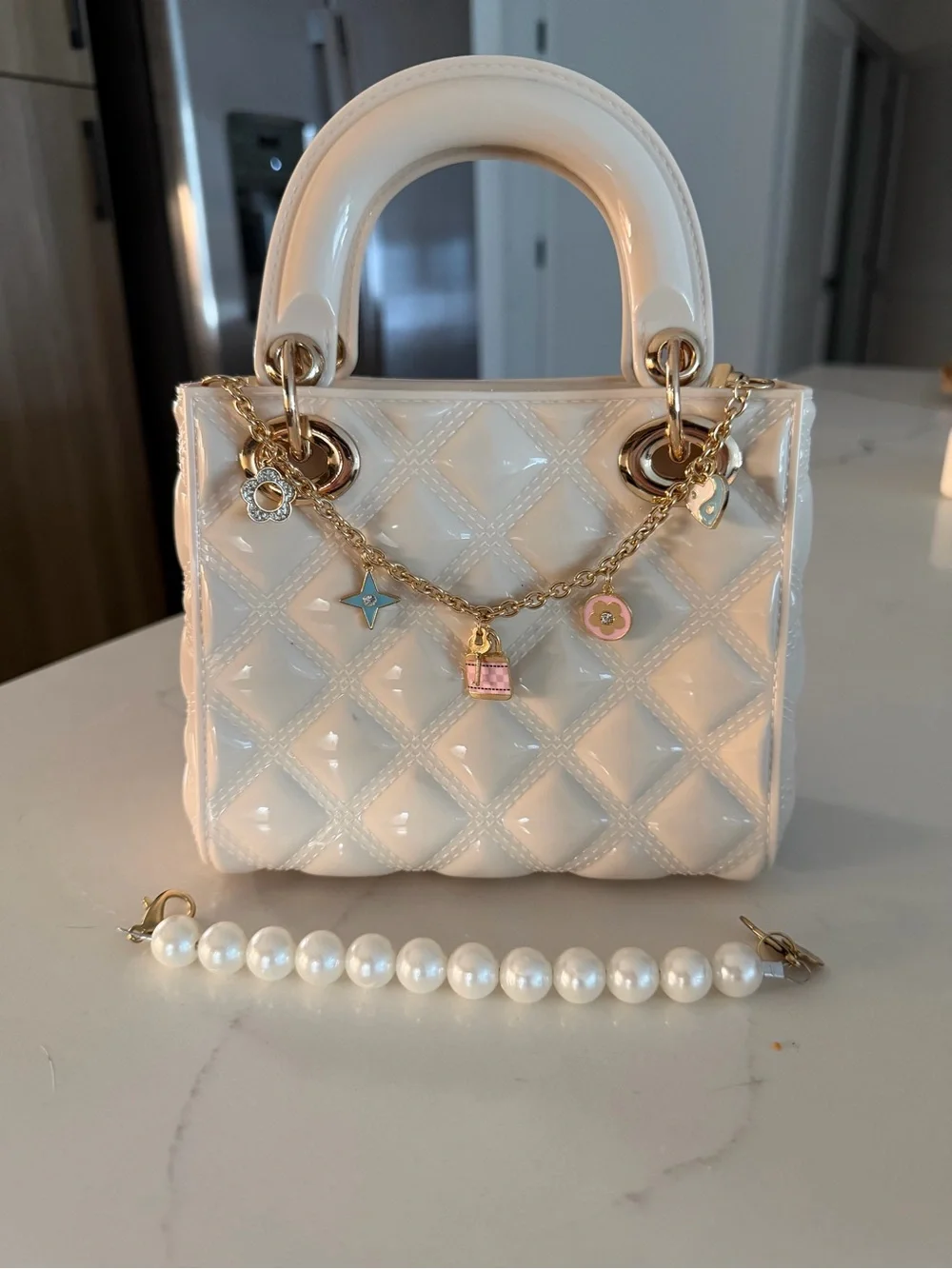 Ivory Quilted Patent Top-Handle Kids Bag with Charm Chain